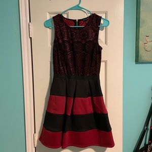 Red and black dress with lace top.
